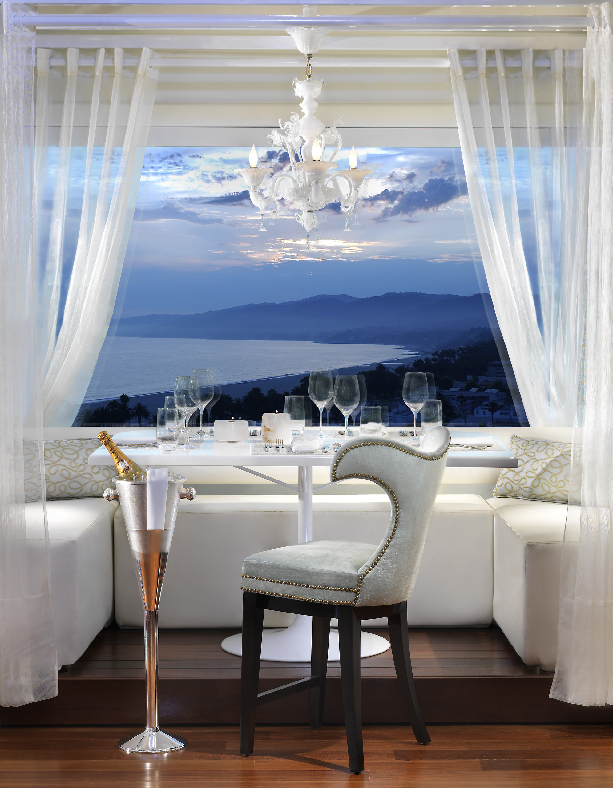 Penthouse Cabana table at sunset with champagne