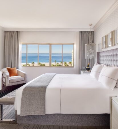 Premier guest room with beach view and modern decor.